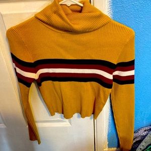 Yellow turtleneck shirt
